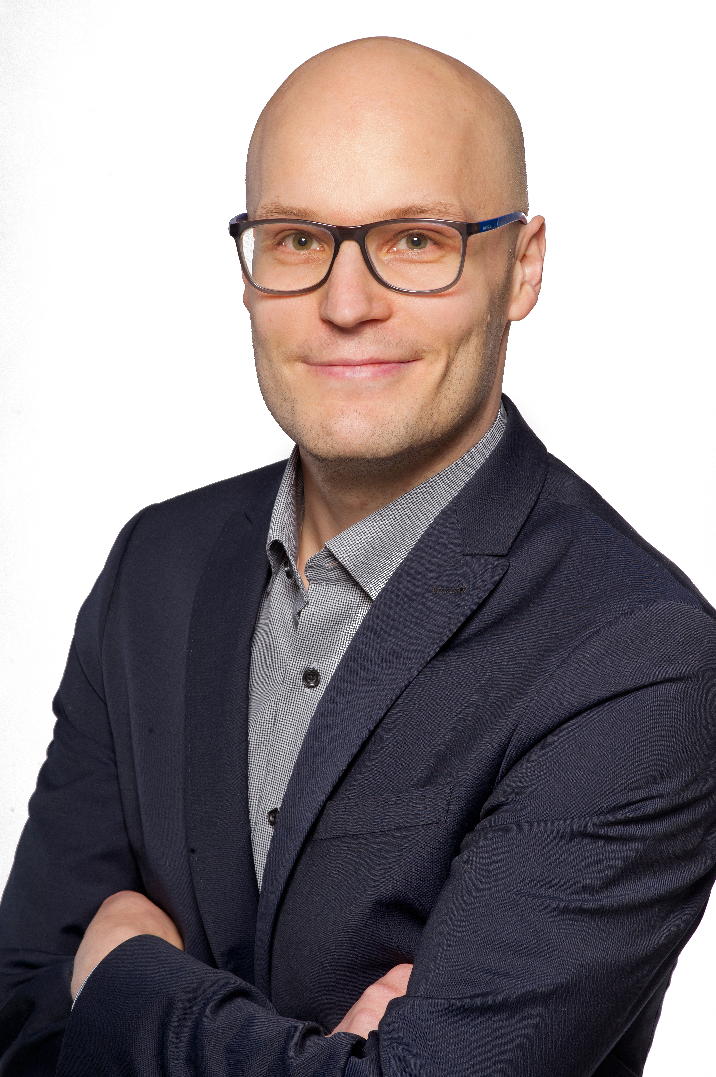 Dr. Marcus Komann
